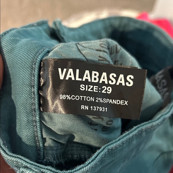 Stylish Teal Stacked Flare Jeans with Black Accents - Picture 4 of 4